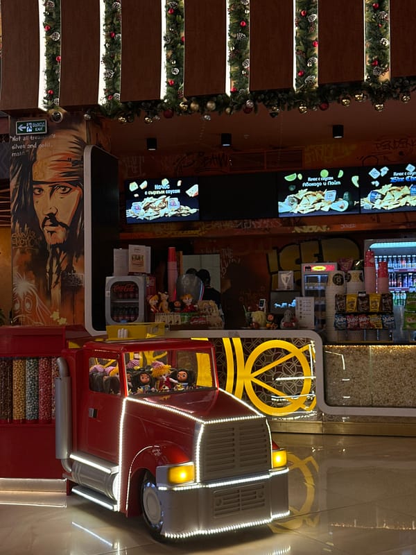 Cinema concession stand displays colorful popcorn varieties in Rostov-on-Don