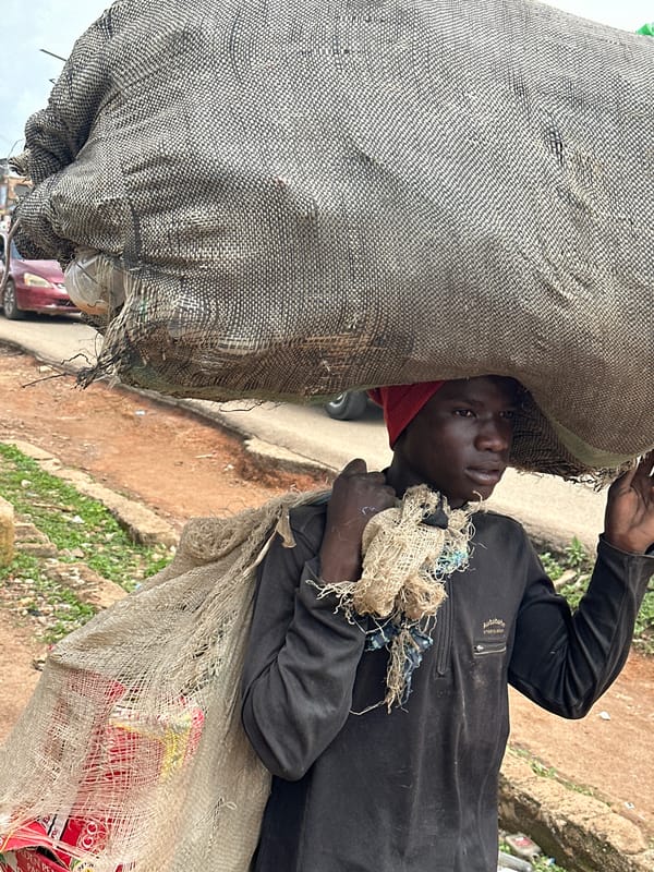 Everyday street life and roadside commerce in Gura Top, Nigeria