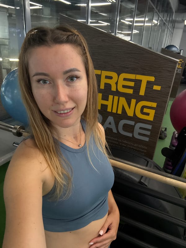 Woman photographed at gym stretching area Thursday morning