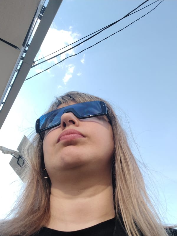 Woman gazes skyward in Yaroslavl