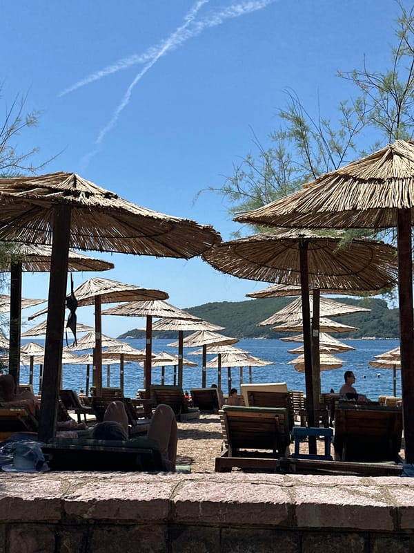 Summer morning on the beaches and waterfront of Budva