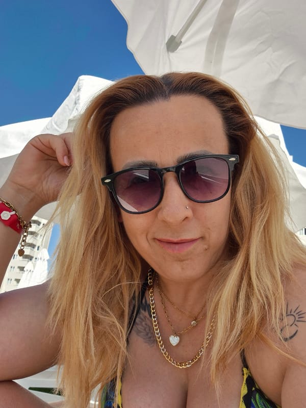 Relaxing under beach umbrellas on a sunny coastal afternoon
