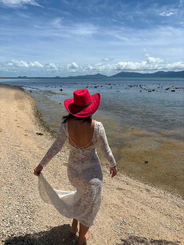 White lace dress shoot along the Baan Bo Phut shoreline