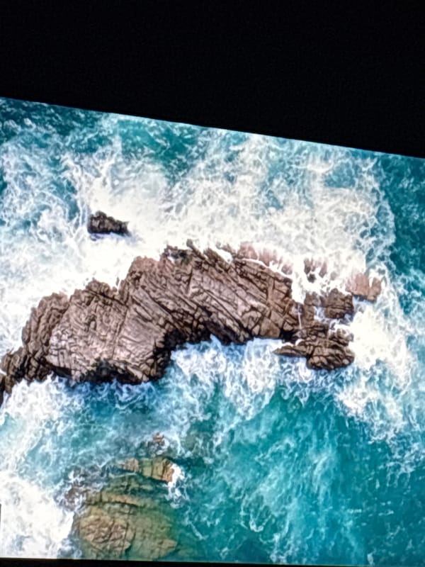 Digital screens display dramatic landscapes in Armenia evening session