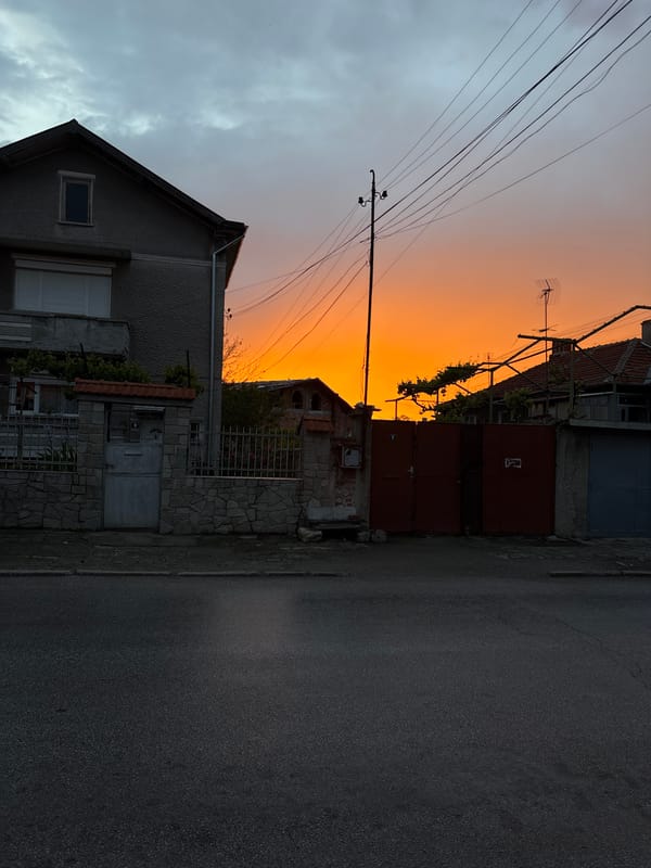 Dusk settles over residential street in Chirpan, Bulgaria
