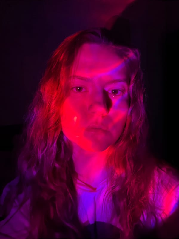 Portrait session captured under colorful lighting in Belgrade suburb