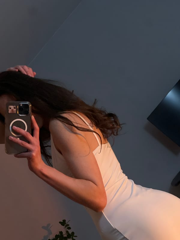 Person Takes Multiple Mirror Selfies in Ternopil Home