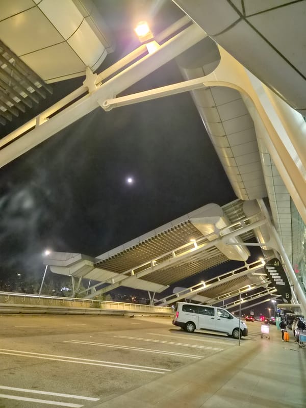 Evening airport terminal activity documented at Porto Airport