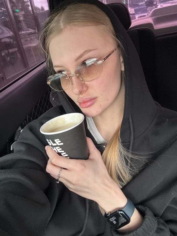 Young woman visits coffee shop in Perm, Russia