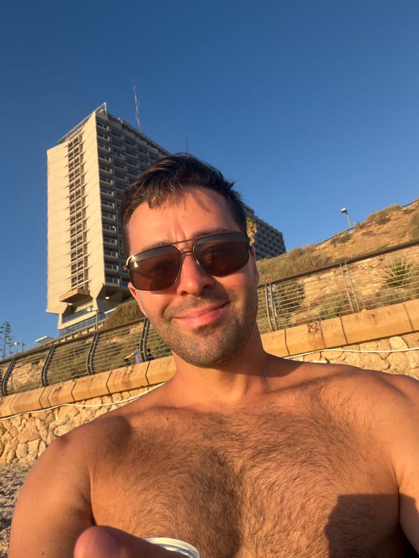 Tel Aviv beach scene with hotel backdrop