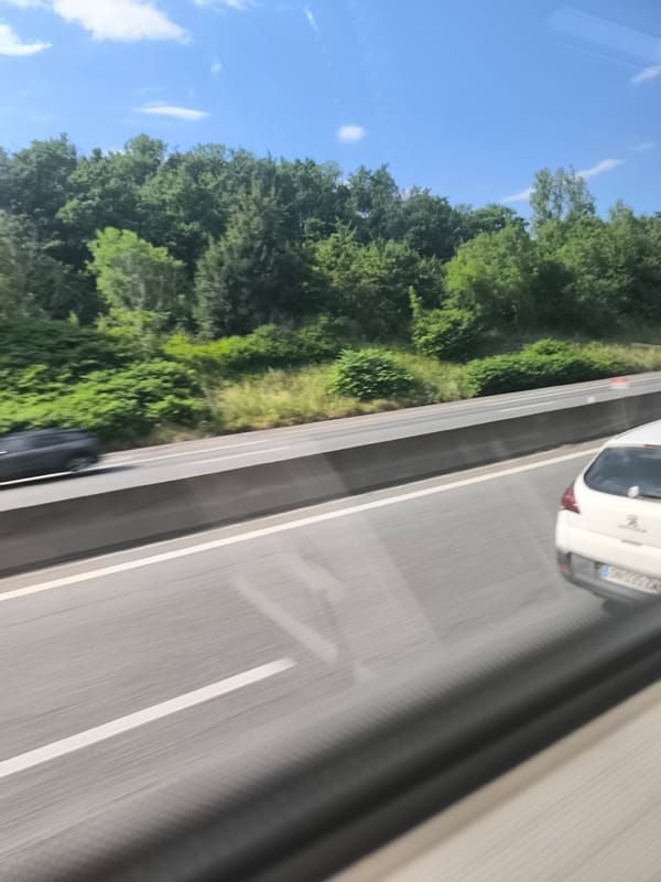 Highway journey documented near Saint-Chamond, France in moving vehicle