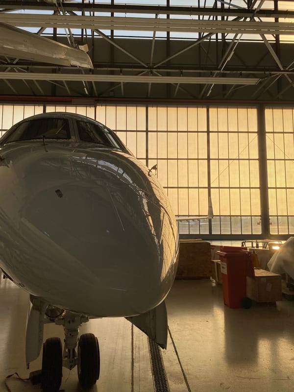 White aircraft documented in hangar at Skulte, Latvia