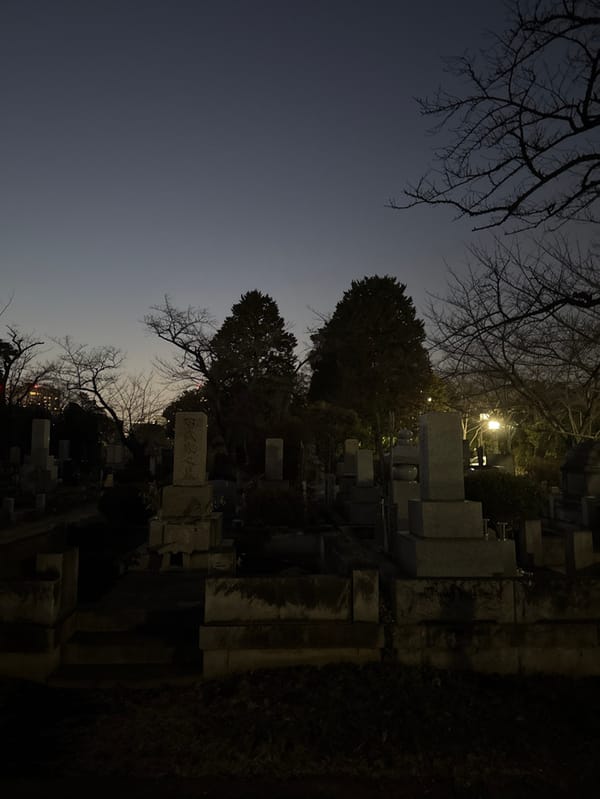 Cemetery scene documented in Minato during evening hours
