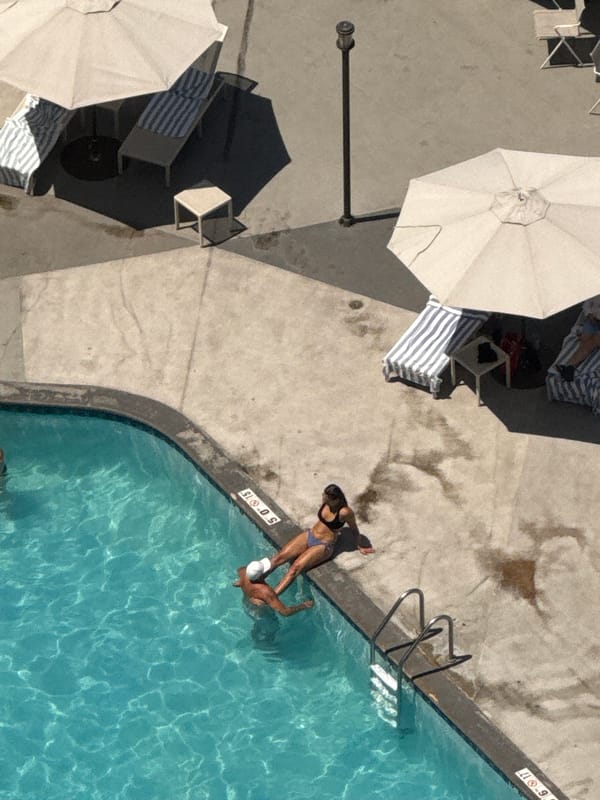 Rooftop pool day in downtown Chicago, summer 2026