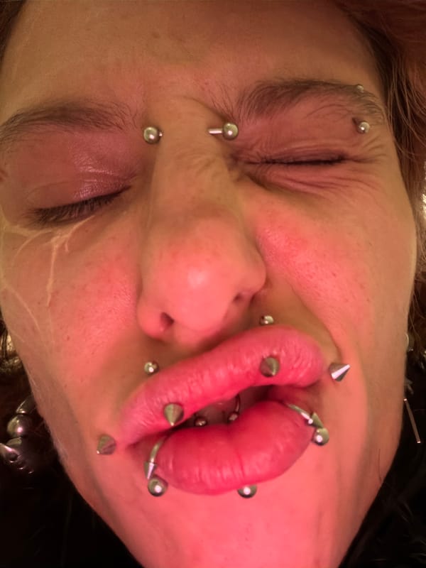 Portrait captures heavily pierced individual in Sofia, Bulgaria