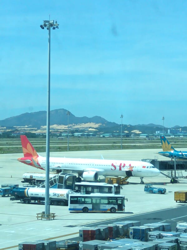 Early morning activity across Cam Ranh Airport, tarmac and terminal