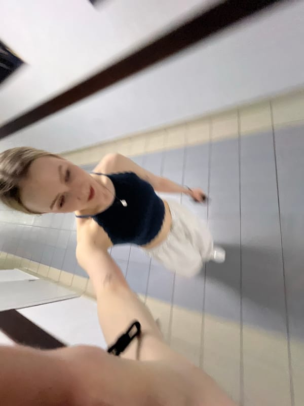 Woman takes selfie in Khimki public restroom