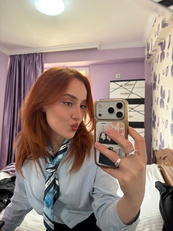 Woman takes selfies in Tbilisi indoor location
