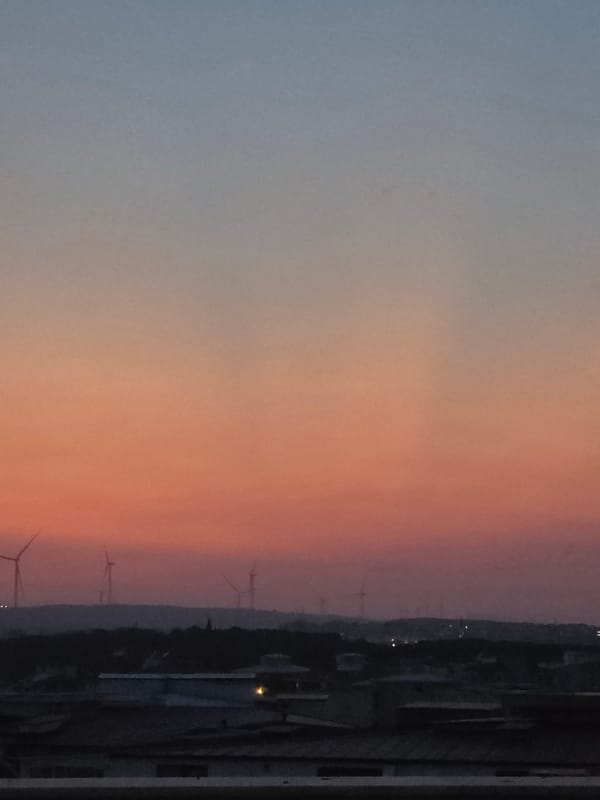 Seferihisar sunset paints the sky orange and pink