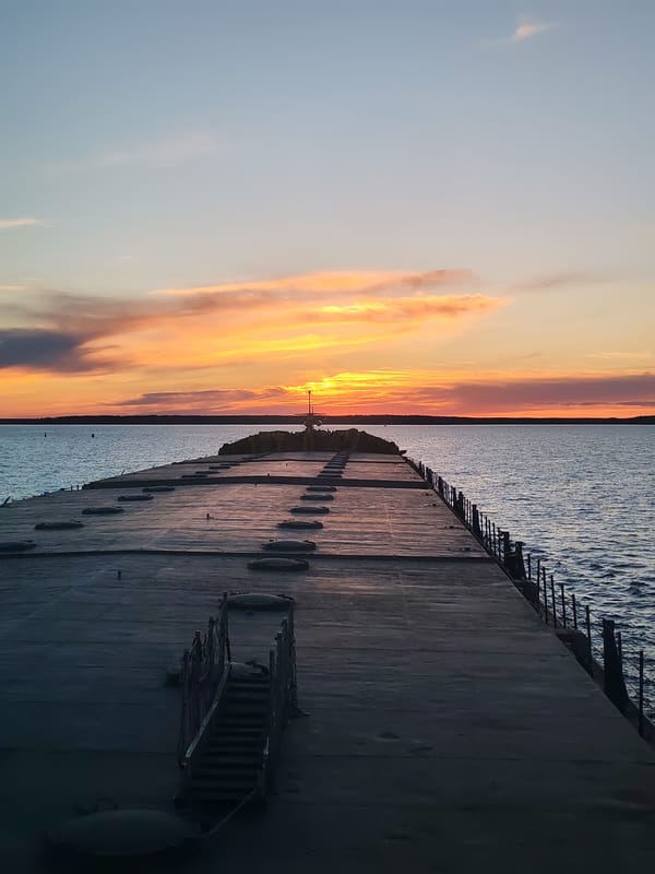 Concrete pier with metal railings documented in Russia