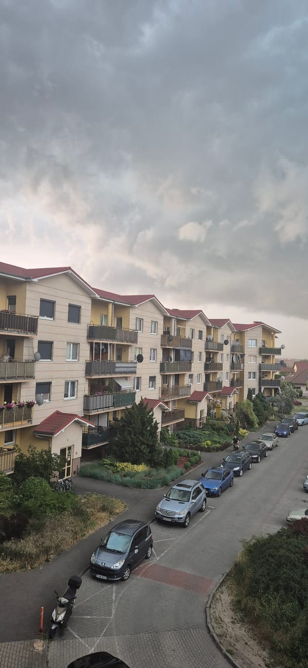 Cloudy day at a red-roofed suburban apartment complex