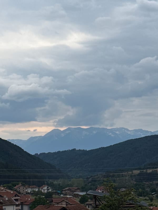 Cats and cloudy mountain village, Yurukovo