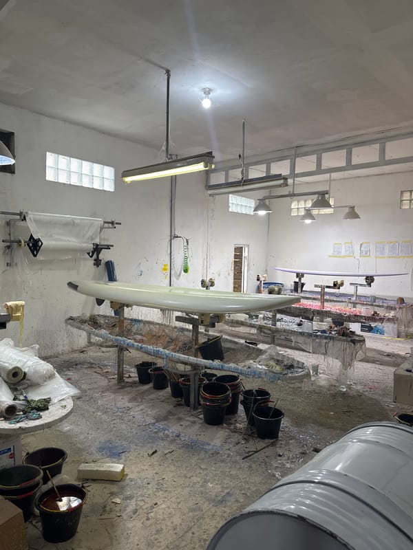 Early morning activity captured at Denpasar surfboard workshop