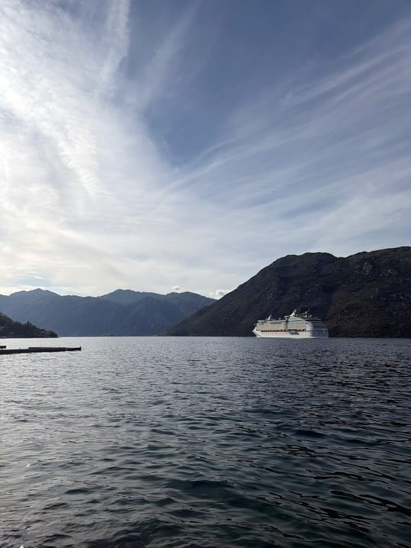 Cruise ship docks in Bay of Kotor near Prčanj, Montenegro