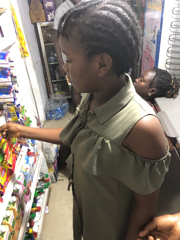 Everyday shopping inside a small kiosk in Ado, Nigeria