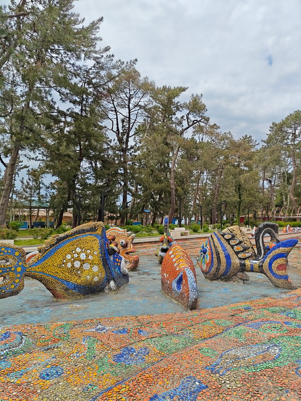 Spring blooms and mosaic fountain captured in Kobuleti park