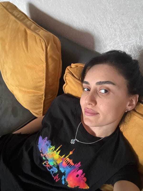 Person documented relaxing and taking elevator selfies in Tbilisi