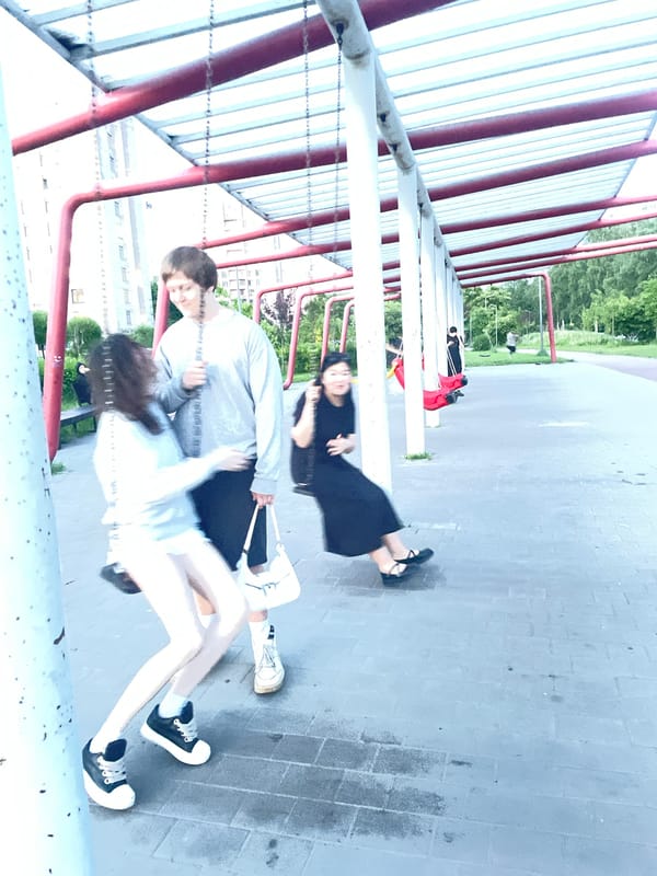 Evening gathering at covered playground in Sinyavino, Russia