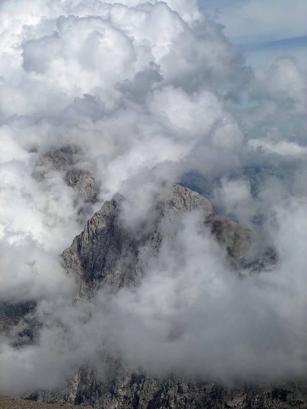 Hiking through cloud-wrapped rocky peaks above Garmisch-Partenkirchen