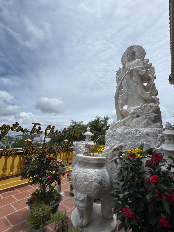Tourist documents Buddhist temples and religious statuary in Da Lat
