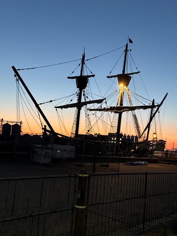 Historic tall ship docked at dusk in Great Yarmouth