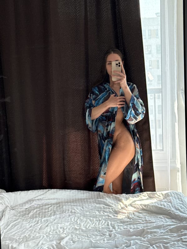 Woman takes morning selfies in Lyubertsy apartment