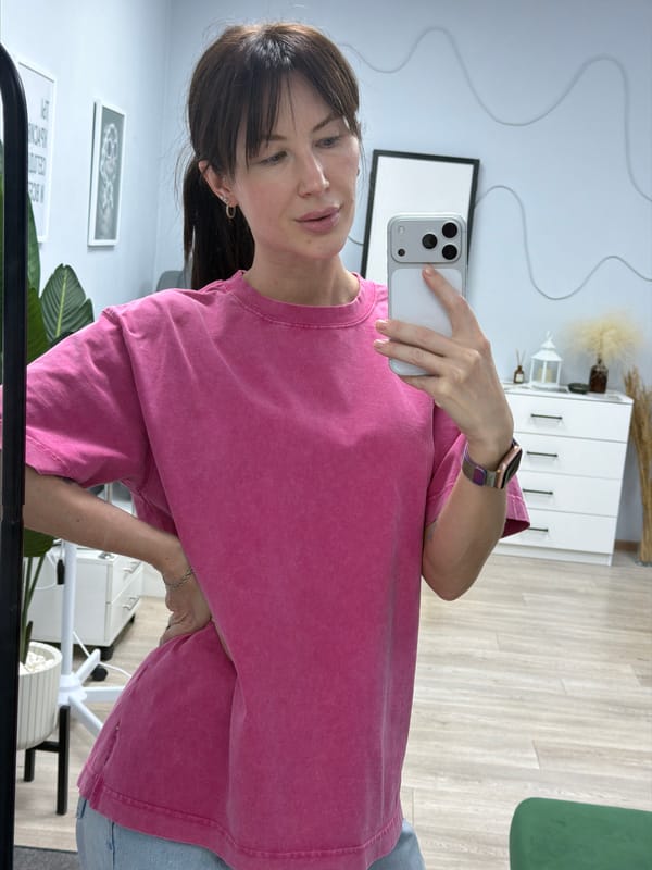 Woman takes selfie indoors in Perm, Russia