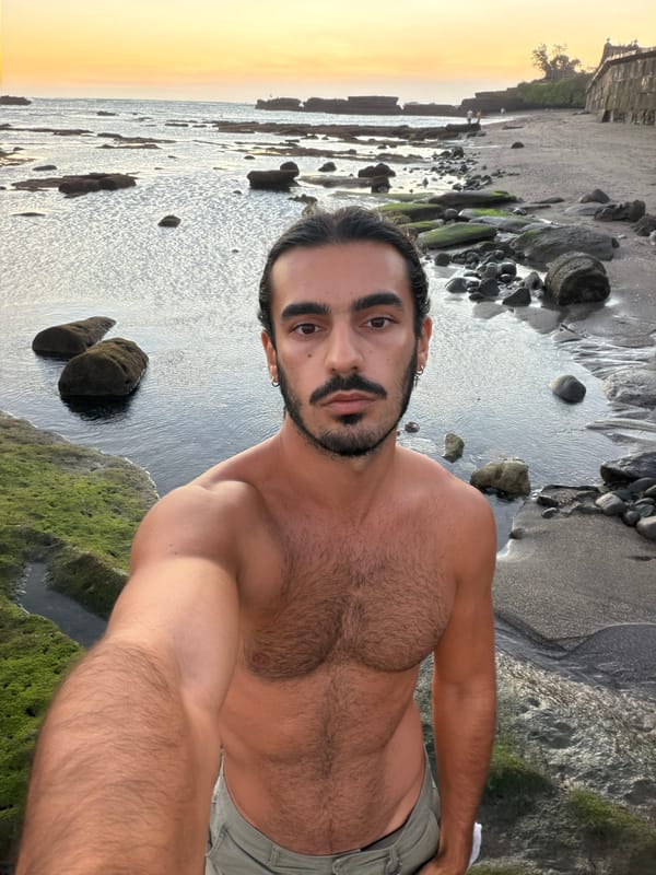 Solo traveler documents sunset selfie session on Indonesian coast