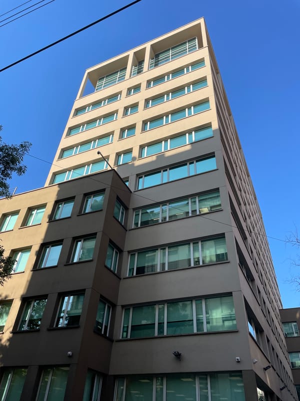 Modern building photographed from below in Buenos Aires