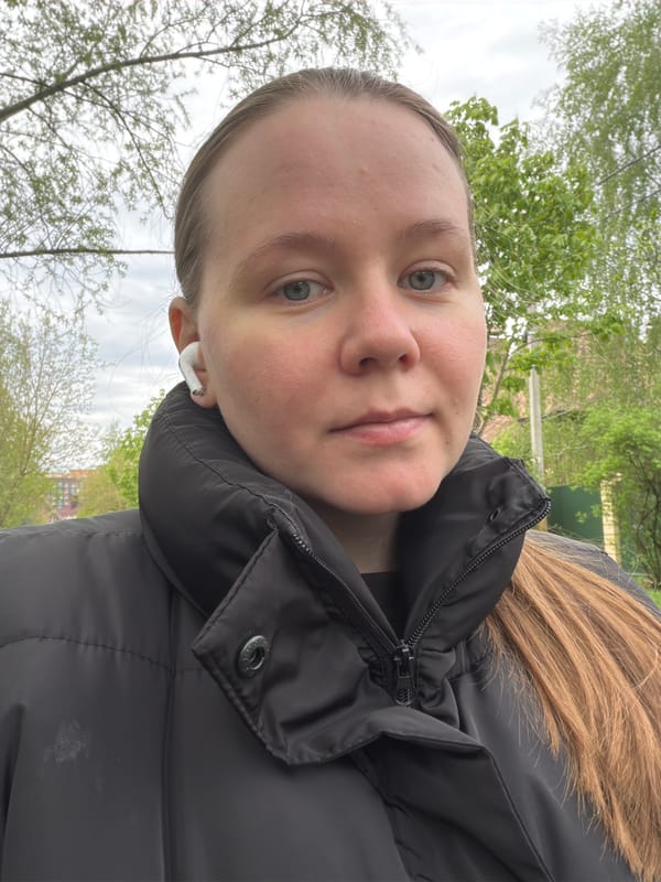 Person in black jacket photographed smiling in Shcherbinka