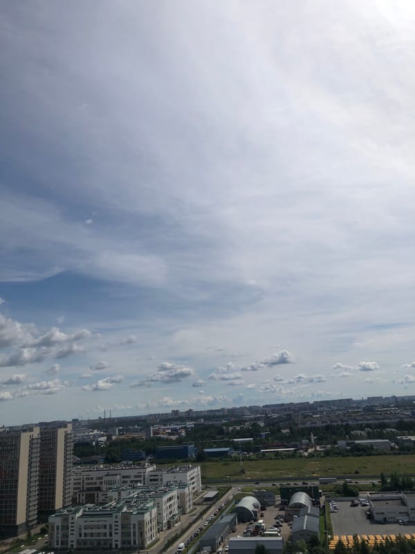 Multiple angles on a dense urban cityscape with towers and wide roads