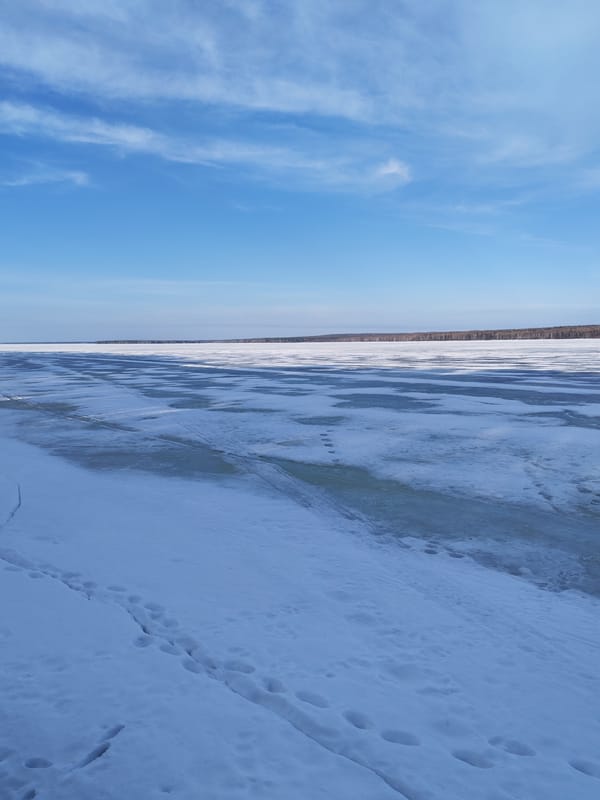 Frozen Votkinsk Reservoir documented in Chaikovsky, Russia winter scenes