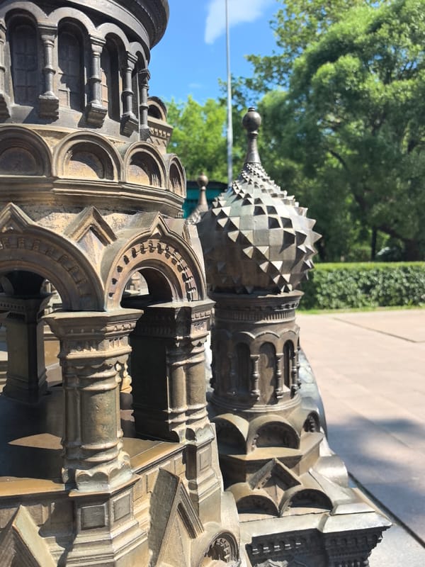 Bronze miniature landmarks explored in a Saint Petersburg park