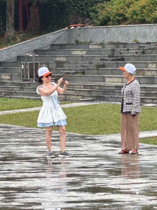 Da Lat opera house and Buddhist temple on a rainy afternoon