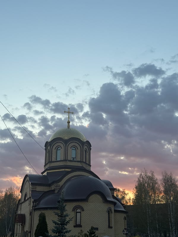 Observer documents Chernushka church and skyline during afternoon