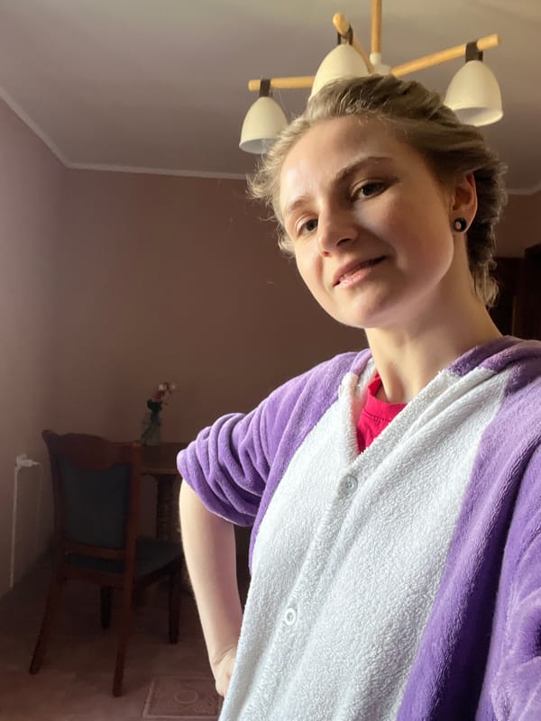 Person and Corgi dog spotted in Novosibirsk home setting