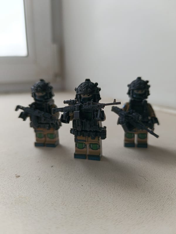 Military-themed Lego collection displayed in coordinated arrangement