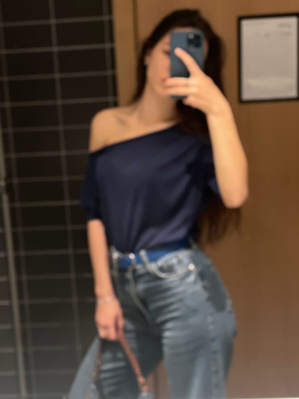 Person takes bathroom selfie in Valencia, Spain