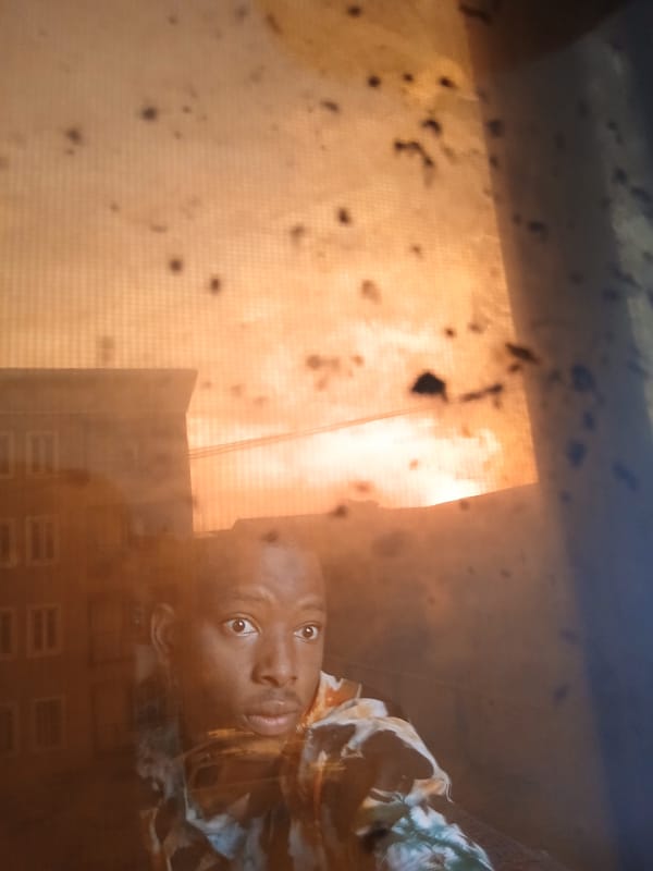 Young man photographed in early morning portraits in Lagos