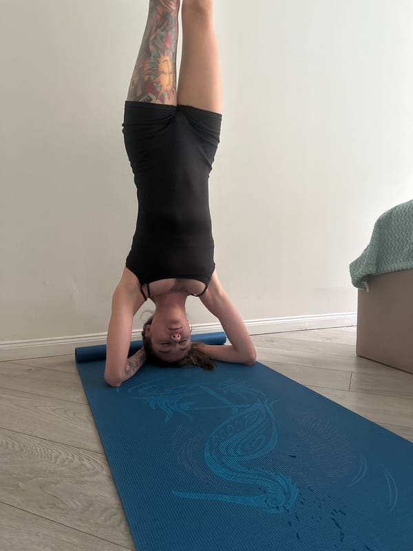 Morning yoga session on a blue mat in Moscow